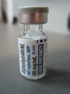 Photo of diphenhydramine HCI bottle.