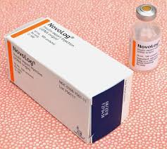 Photo showing package of Novalog with vial next to it.