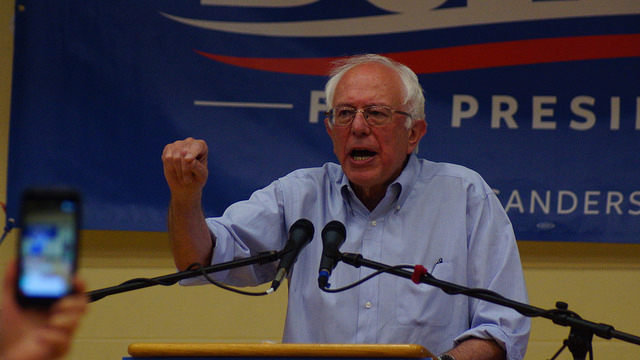 Bernie Sanders speaking at a political rally