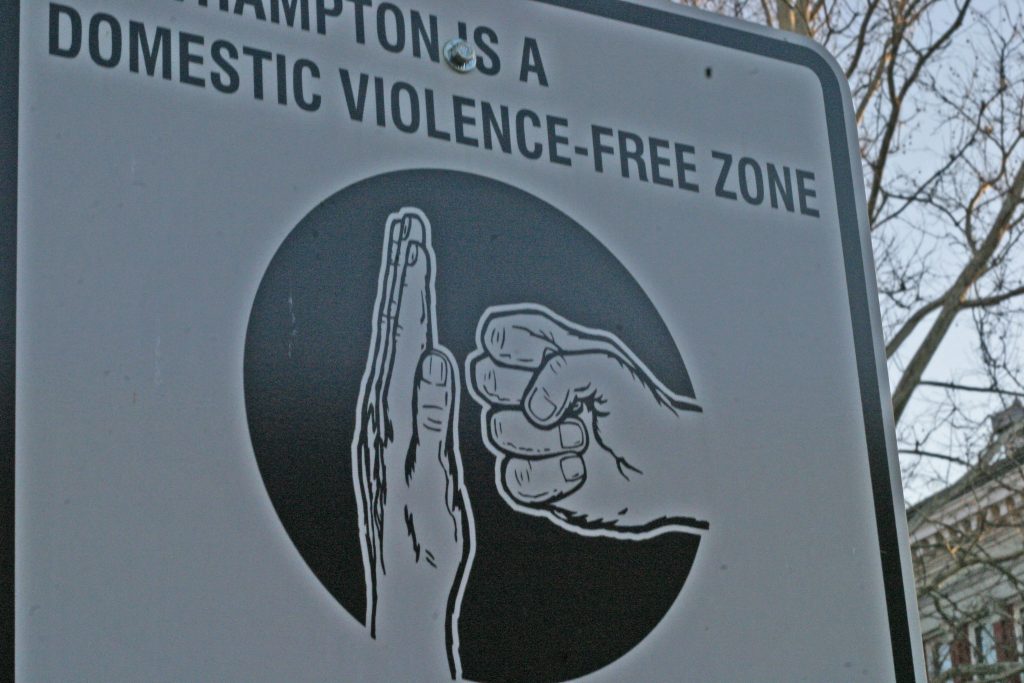 Photo showing community sign against domestic violence
