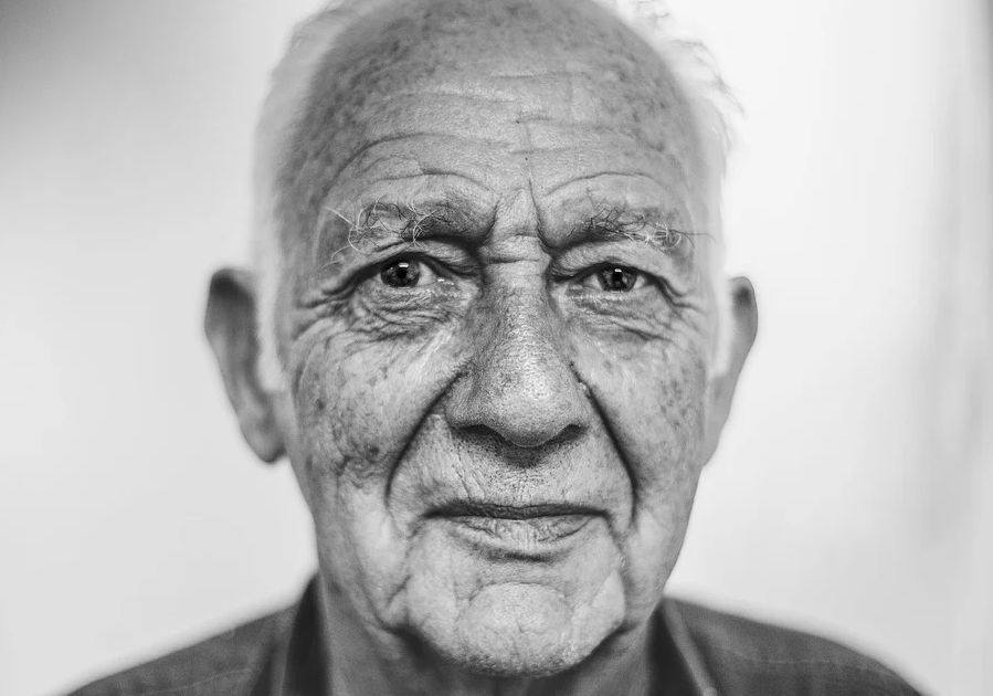 Image showing an older man looking at the camera