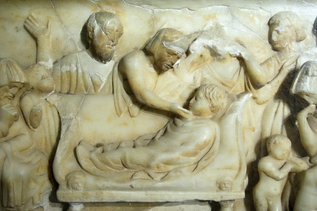Image shouwing Sarcophagus in marble, decorated in relief on three sides for a child. Mourning scene for a child.