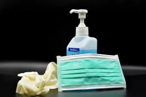 Image showing hand sanitizer, gloves, and a surgical mask