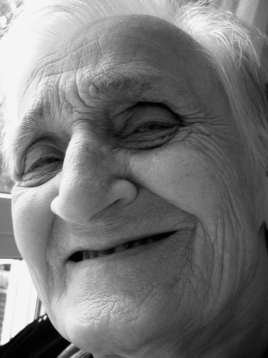 Image showing an elderly woman smiling