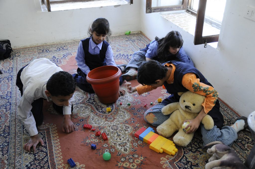 Photo of Children With Special Needs Playing together in a room