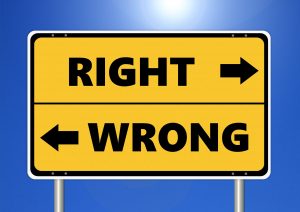 Image showing a sign stating directions for right and wrong