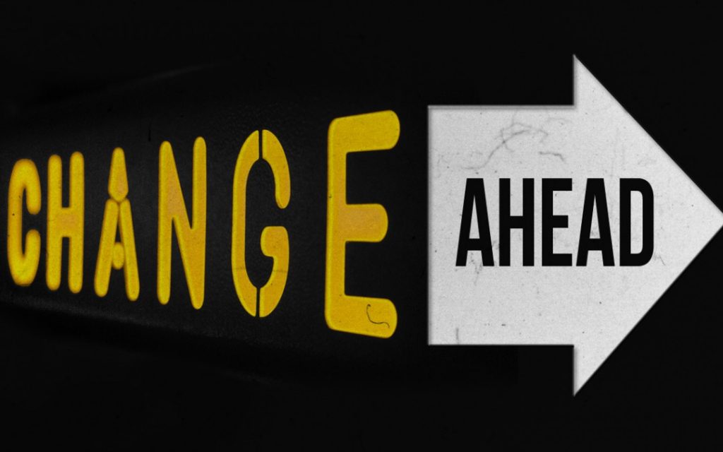 Image showing words change ahead, with ahead inside an arrow shape