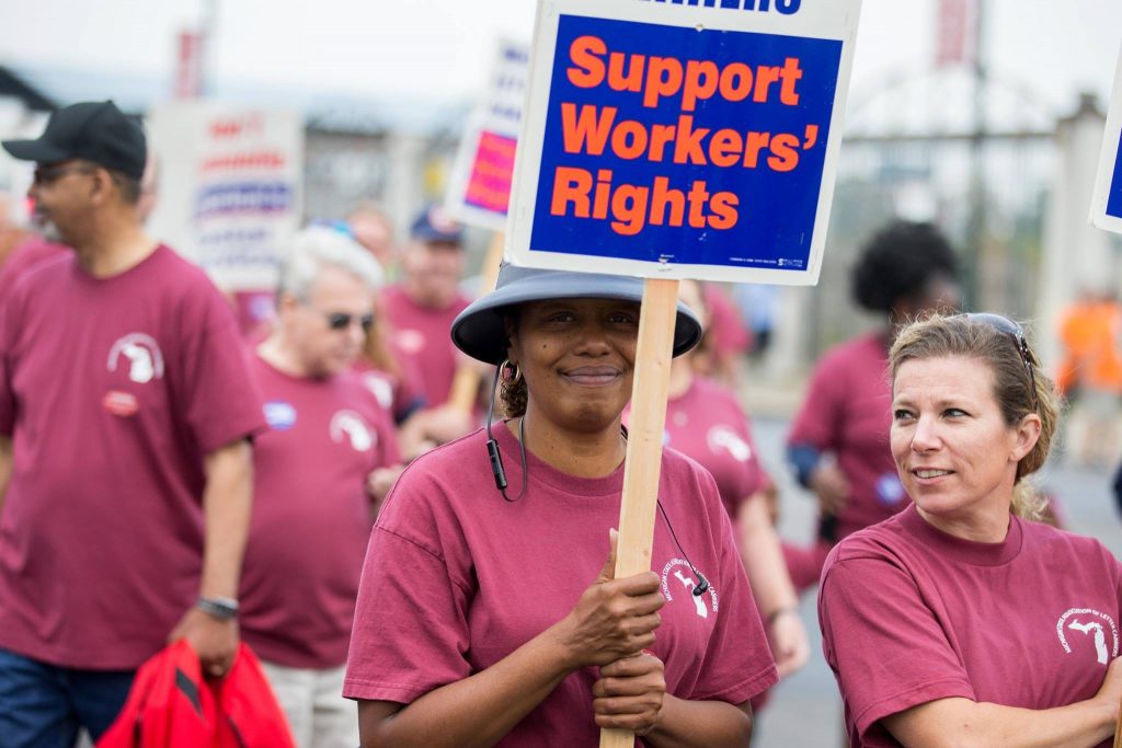 Photo showing union workers protesting with signs