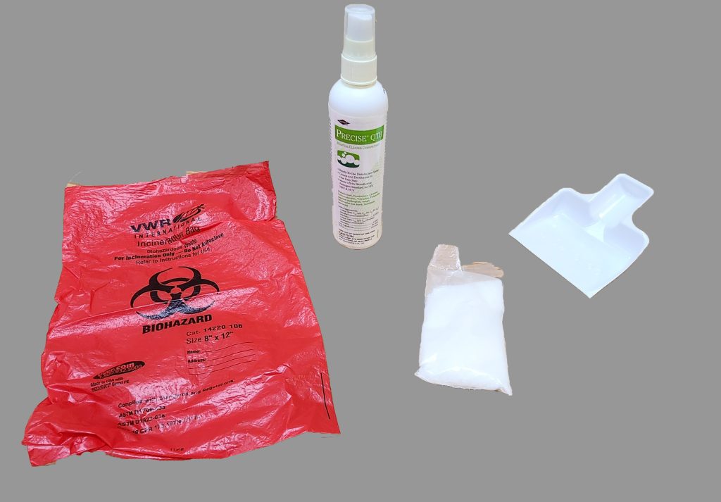 Photo showing components of a blood spill kit