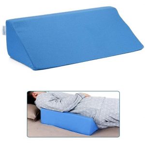 Photos showing a wedge cushion and a person lying on a wedge cushion