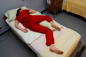 Photo showing a simulated patient in Sim's position