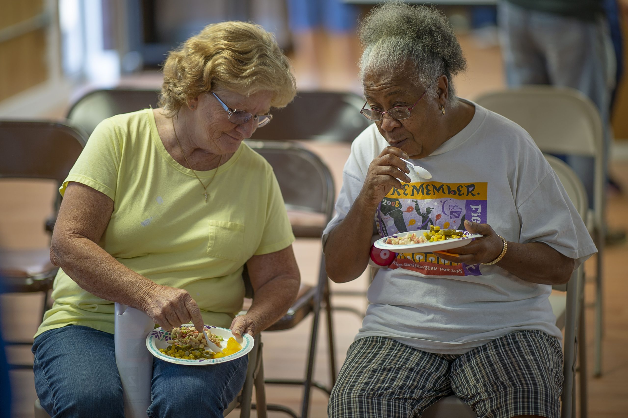 Image showing Older Adults Socializing at Mealtime During a Community Food Pantry