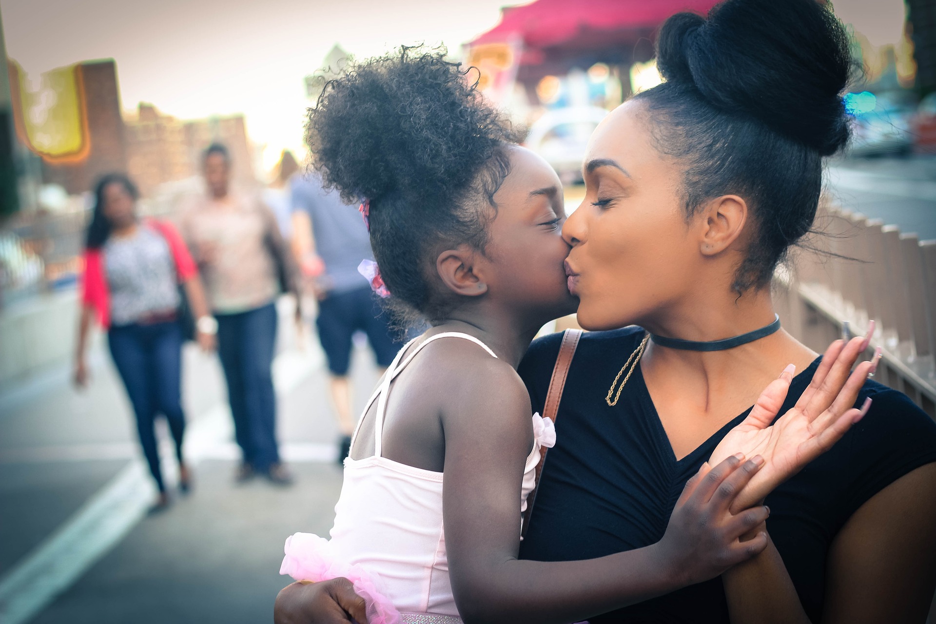 Image showing a mother and child kissing and hugging