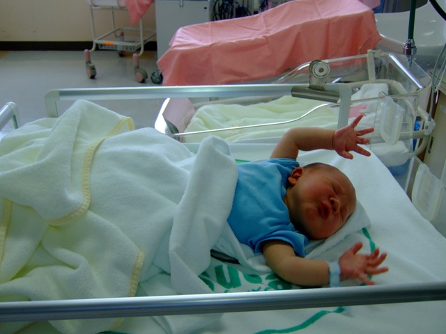 Photo showing an infant's moro reflex