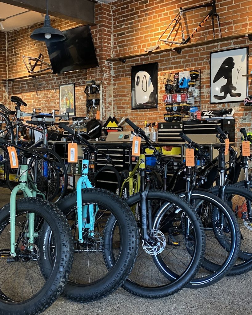 Image showing bicycles lined up in a repair shop